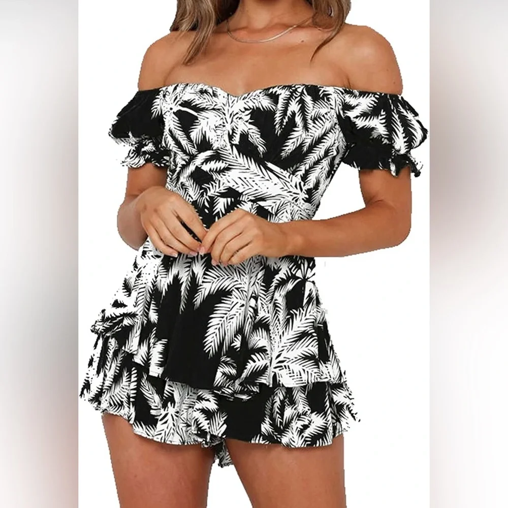 black and white romper. it flows like a dress and covers up your midsection. - Picture 1 of 1